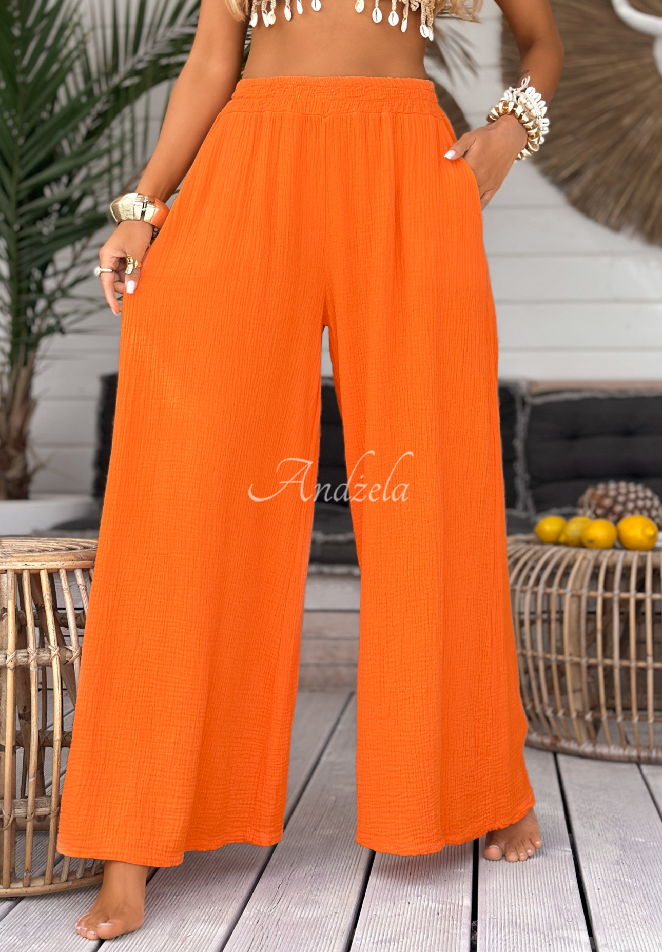 Mušelínové kalhoty wide leg Paradise Bay oranžové