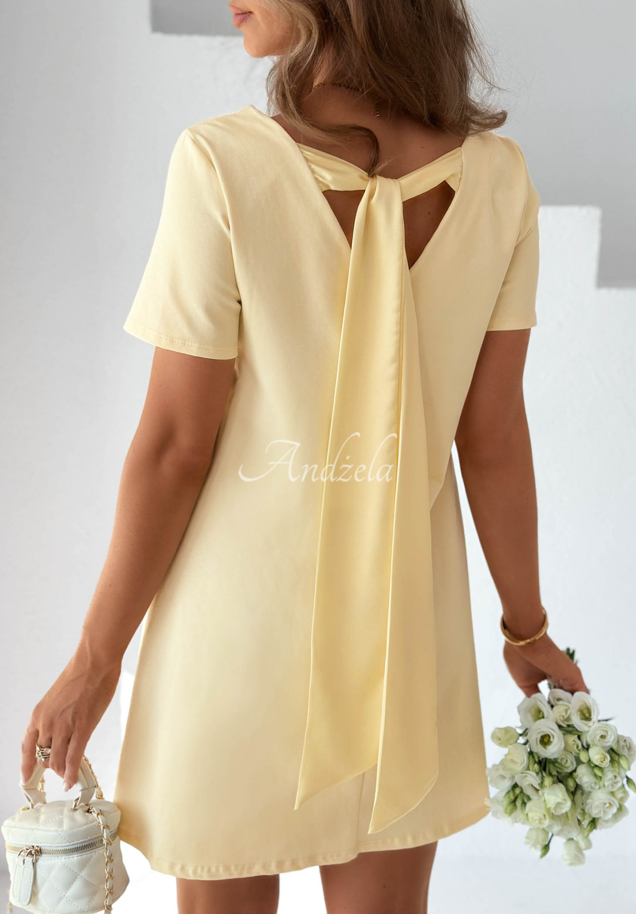 Bavlněné mini šaty s mašlí Mariette žlutá