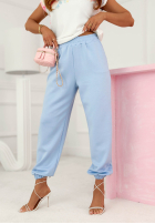 Kwieciste materiálové Kalhoty Evela béžové