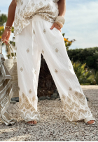 materiálové Kalhoty wide leg vzorované Sunset Paradise biało-béžové